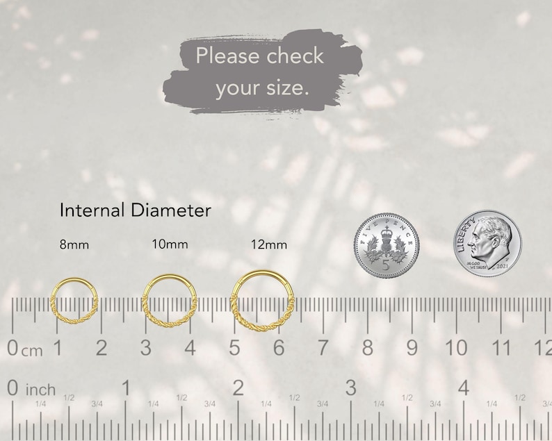 May include: Three gold-colored hoop rings with textured surfaces, labeled with internal diameters of 8mm, 10mm, and 12mm. A ruler shows measurements in inches and centimeters. A five-pence coin and a dime are included for scale. Text reads: Please check your size.
