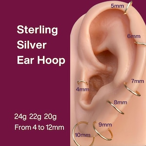 May include: An image showcasing sterling silver ear hoops in sizes ranging from 4mm to 12mm, displayed on an ear model. The image includes text indicating the gauge sizes: 24g, 22g, and 20g. The hoops are gold-colored.