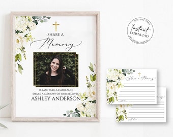 Puede incluir: Un cartel conmemorativo floral blanco con una cruz y un marco dorado. El cartel dice "Compartir un recuerdo" e incluye una foto de una mujer. El cartel también incluye el texto "Por favor, tome una tarjeta y comparta un recuerdo de nuestra querida Ashley Anderson."