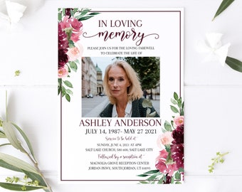 May include: A white memorial card with a burgundy border and floral design. The card features a photo of a woman and the text "IN LOVING MEMORY" with the name "ASHLEY ANDERSON" and the dates "JULY 14, 1987 - MAY 27, 2021". The card also includes details about a service and reception.