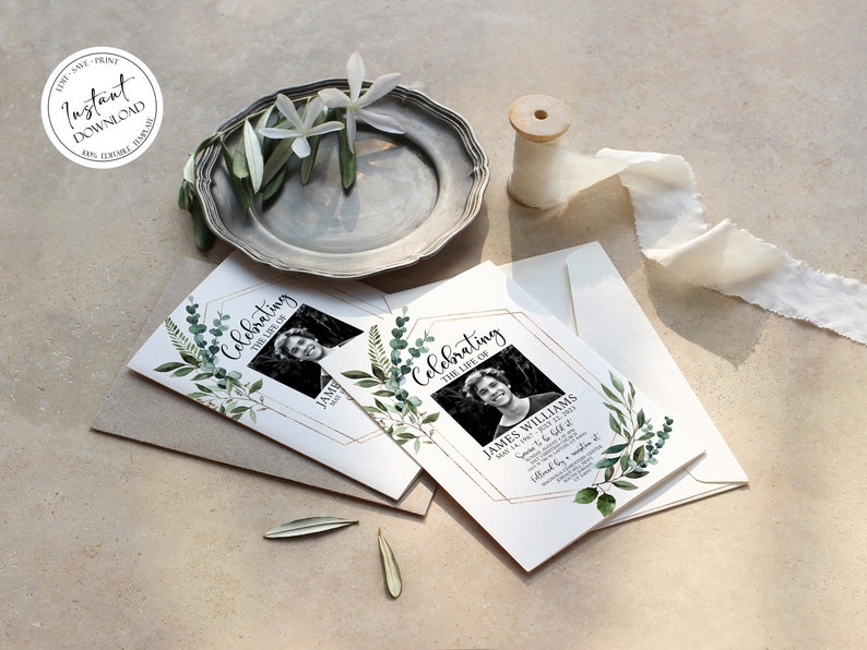 May include: Two white cards with gold accents and green watercolor foliage. The cards have a photo of a person and the text "Celebrating the life of" and "James Williams".