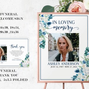 May include: Funeral welcome sign with a photo of a woman and floral design. The sign reads "In loving memory" and "Ashley Anderson, July 14, 1987 - May 27, 2021".