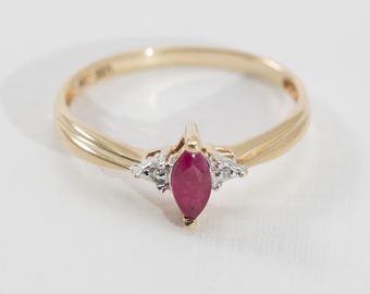 Ruby Marquise Gemstone with Diamond accents, 10k Yellow Gold, Ring Size 7