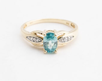 Blue Topaz with CZ accents, 10k Yellow Gold, Ring Size 7, Gemstone 4.5x6.5mm