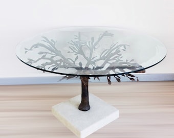 Wrought iron coffee table with marble base