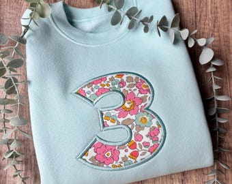 Pastel Blue Birthday Jumper | Embroidered Party Outfit | Liberty Fabric | Custom Sweatshirt | Birthday Boy | Birthday Girl | Gift Idea