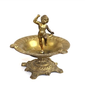 Cenicero antiguo de metal “Putti”, siglo XIX/principios del XX