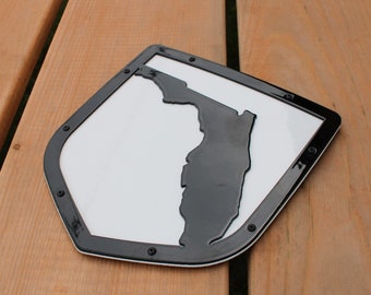 Insignia para portón trasero de Florida