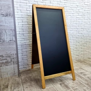 Sidewalk sign • Pavement board • Advertising sign • Personalised business signboard • Chalkboard • Business logo outdoor sign • Ground sign