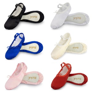 May include: Six pairs of ballet shoes in different colours: black, white, blue, beige, pink, and red. The shoes are made of satin and have a ribbon tie at the front. The shoes are all laid out on a white background.