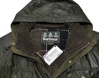 Giacca cerata Barbour tigrata con tartan classico