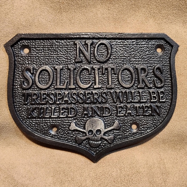 No Solicitors sign ~ cast iron ~ trespassers skull and cross bones ~ quirky plaque