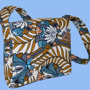 AYO Elegant, eye-catching crossbody bag made of exquisite quality African wax print (Ankara) fabric. Sits comfortably across your body