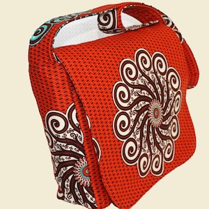 AYO Elegant, eye-catching crossbody bag made of exquisite quality African wax print (Ankara) fabric. Sits comfortably across your body