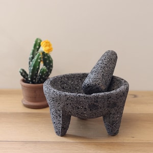 Perfect for salsas, guacamole, meats, barbecues, seafood, appetizer, etc. These bowl & pestle molcajetes are a must have for your parties, family dinners,  restaurant, or formal special occasions. Black/dark grey lava rock.