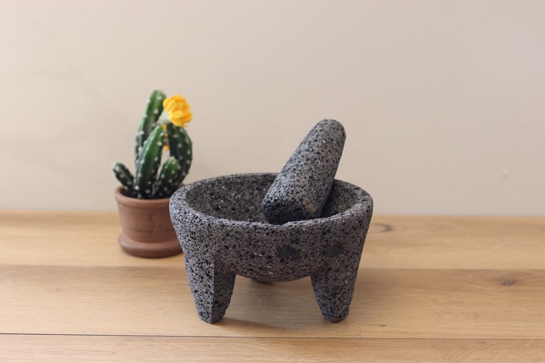 Perfect for salsas, guacamole, meats, barbecues, seafood, appetizer, etc. These bowl & pestle molcajetes are a must have for your parties, family dinners,  restaurant, or formal special occasions. Black/dark grey lava rock.