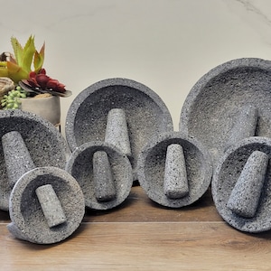 Perfect for salsas, guacamole, meats, barbecues, seafood, appetizer, etc. These bowl & pestle molcajetes are a must have for your parties, family dinners,  restaurant, or formal special occasions. Black/dark grey lava rock