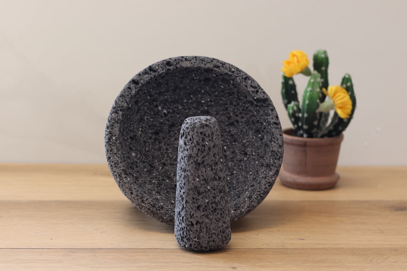 Perfect for salsas, guacamole, meats, barbecues, seafood, appetizer, etc. These bowl & pestle molcajetes are a must have for your parties, family dinners,  restaurant, or formal special occasions. Black/dark grey lava rock.