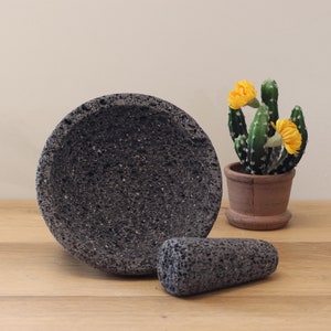 Perfect for salsas, guacamole, meats, barbecues, seafood, appetizer, etc. These bowl & pestle molcajetes are a must have for your parties, family dinners,  restaurant, or formal special occasions. Black/dark grey lava rock.