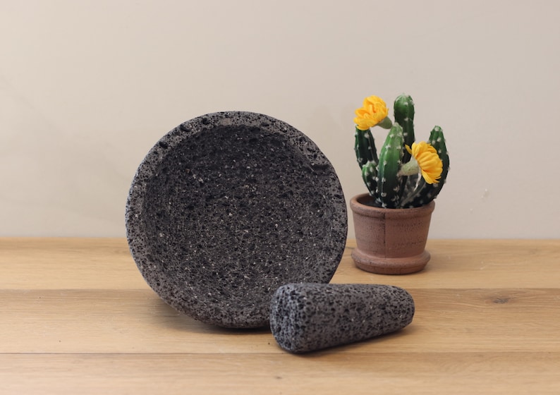 Perfect for salsas, guacamole, meats, barbecues, seafood, appetizer, etc. These bowl & pestle molcajetes are a must have for your parties, family dinners,  restaurant, or formal special occasions. Black/dark grey lava rock.