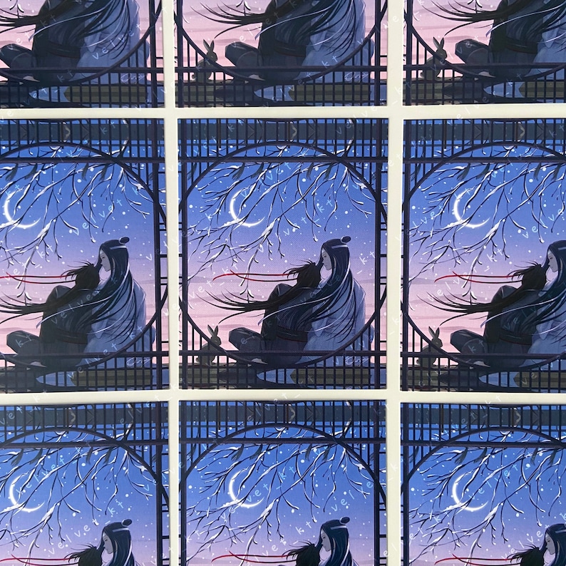 May include: A set of nine illustrated cards featuring a couple embracing under a crescent moon and starry sky. The couple is silhouetted against a dark blue background with a red ribbon flowing behind them. The cards are framed by a black lattice design.