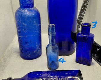 Mixed group of 1920s Cobalt Blue Glass  bottles