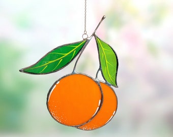 Orange. Stained glass window suncatcher. Stained glass window hangings. Decorations for the window.