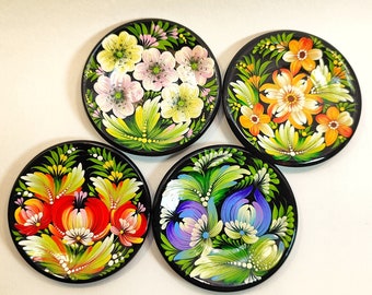 Decorative plates. Wall plates. Decor on the wall. Popular today. Petrykiv painting. Handmade. Flowers on the wall