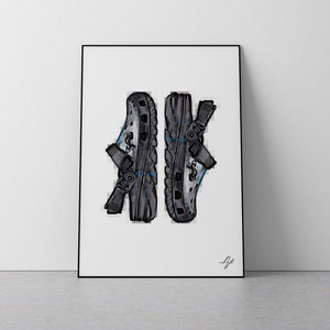 May include: A black and white illustration of two pairs of black and blue sandals with a white background.