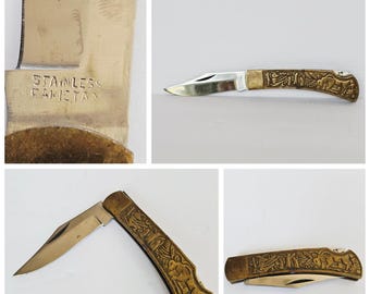 Vintage mässingsfällbar fickkniv präglad djurmotiv rostfritt stål Pakistan