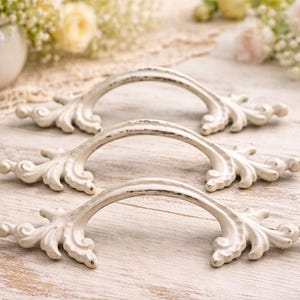 3 Vintage Brass French Provincial Pull Handles.  Sold as One Lot. 1.5” From Centre.