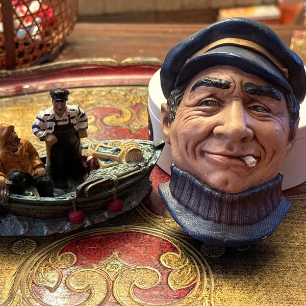 Two Vintage Nautical Themed Casts. One Head Plaque of a Weathered Sailor/Captain.  One Fisherman’s Boat.   1950 MCM