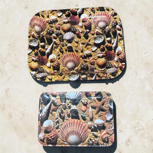 May include: A rustic wooden sign with the text "Welcome" in a handwritten style. The sign is painted white with a distressed finish, and features a decorative floral element. Perfect for front door decor.