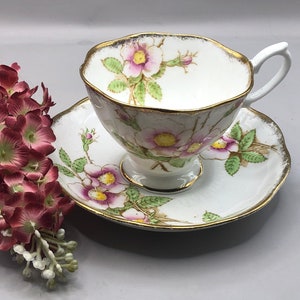 1930-1940 Crown Royal Albert “Wild Rose” Teacup & Saucer Bone China Made in England