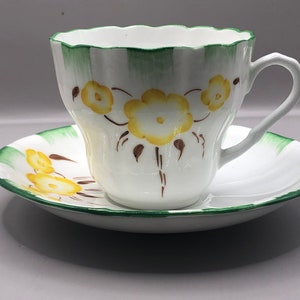Two Melba Bone China Teacup & Saucers #4888 w/yellow Flowers