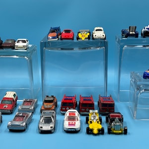 23 Hot Wheels Car Collection. Sold As One Lot. Various Ages Feom 1970s, 1980s, and 1990s. Die Cast Cars.  Vintage.