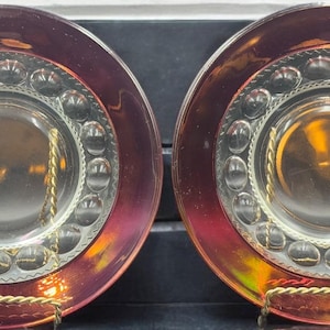 Two 8.25” Round Vintage Indiana Cranberry Kings Crown Thumbprint Glass Plates.
