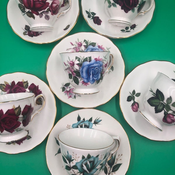 A Thrifty Collection of Six Royal Vale Bone China, England, Rose Themed Teacups & Saucer Sets. Red. Pink. Blue. Turquoise.