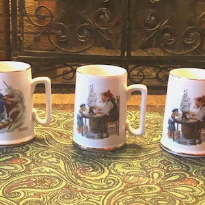 vintage 1985 The Norman Rockwell Museum, Inc. Mugs avec oeuvre d&#39;art « For a good boy » et « Braving the Storm ».