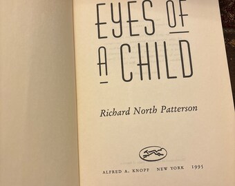Couverture souple du livre « Les yeux d'un enfant » de Richard North Patterson. Barzoï.  1994. Alfred A. Knopf, Inc.