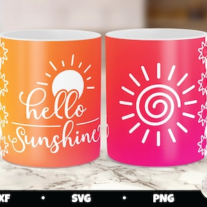 May include: Two white ceramic mugs with a gradient design. One mug has an orange to pink gradient with the text "hello sunshine" and a sun graphic. The other mug has a pink to red gradient with a sun graphic.