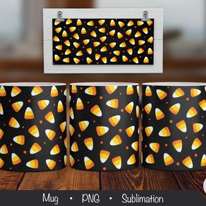 May include: Three white ceramic mugs with a black background and a pattern of orange and yellow candy corn. The mugs are for sublimation.