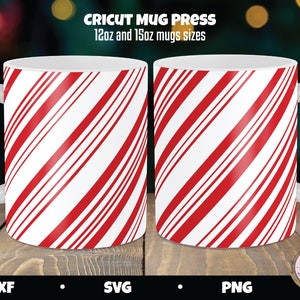 May include: Two white mugs with red and white candy cane stripes. The mugs are 12oz and 15oz sizes. The text "Cricut Mug Press" is at the top of the image.