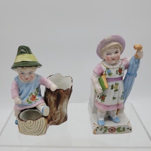 Antique German Girl and Boy Fairings, Match holders with Striker on back