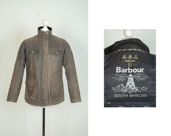 Chaqueta encerada verde con capucha desmontable Barbour de color Negro