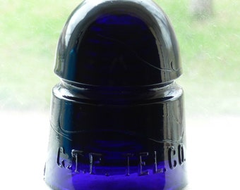 G.T.P. violet antique fabriqué au Canada TÉL. Isolateur en verre CO.