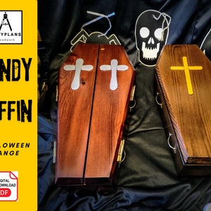 May include: Two wooden candy coffin boxes with cross designs. The boxes are brown with a dark wood stain. The boxes are on a black fabric background.  The text "CANDY COFFIN HALLOWEEN RANGE" is on a yellow background.