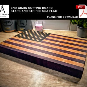 May include: End grain cutting board with a Stars and Stripes USA flag design. The board features alternating stripes of light and dark wood, with a dark wood square containing white dots. The text "END GRAIN CUTTING BOARD STARS AND STRIPES USA FLAG" is visible.