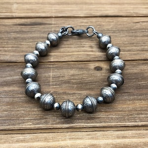 Navajo Pearl Style Flower Stamped Seamed Sterling Silver Bracelet