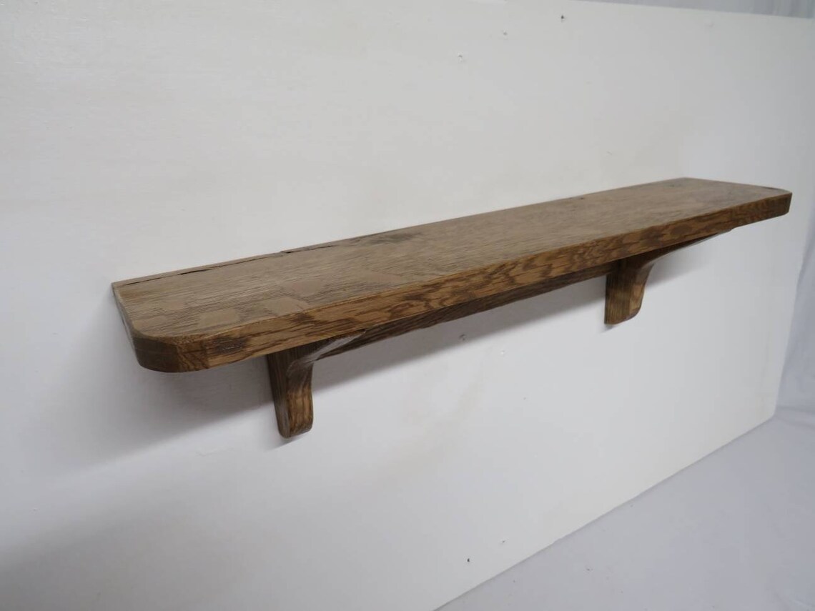 Small oak shelf with brackets. Wall mounted Dark stain. Etsy